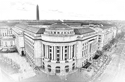 Historic building with Washington Monument in background